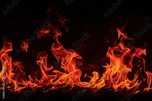 Fire flames on a black background, an abstract concept of passion and energy