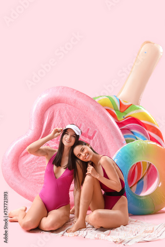 Female friends in beachwear...
