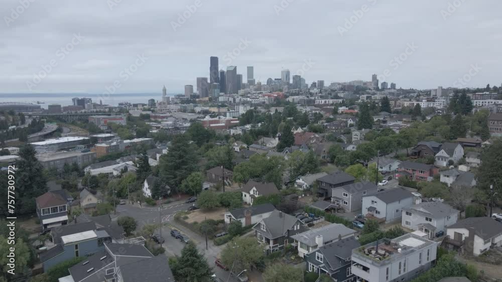 AERIAL DRONE SHOT OF DOWNTOWN SEATTLE SKYLINE ON AN OVERCAST CLOUDY DAY AERIAL DRONE SHOT OF DOWNTOWN SEATTLE SKYLINE ON AN OVERCAST CLOUDY DAY