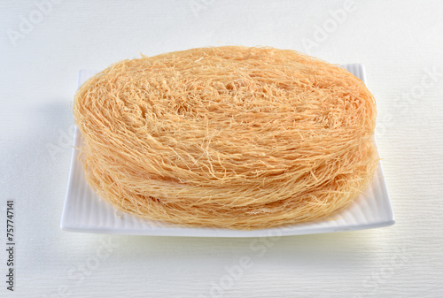 Pheni, Lachha or fried vermicelli is a healthy cereal. It is made by wheat flour and Desi Ghee and use with warm milk, sugar and nuts.