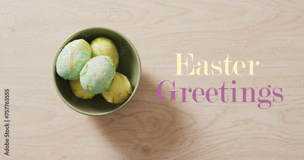Fototapeta premium Image of easter eggs and easter greetings text