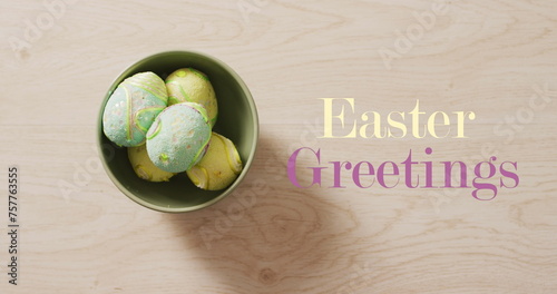 Image of easter eggs and easter greetings text