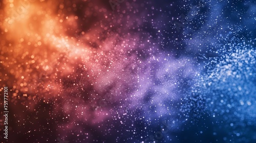 Gradient of particles from warm to cool tones. Abstract cosmic dust background suitable for creative projects