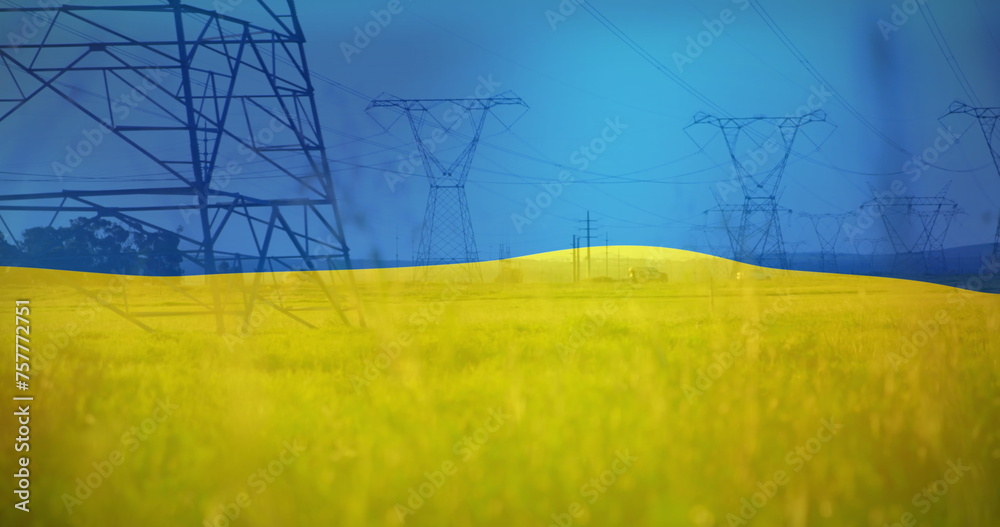 Fototapeta premium Image of flag of ukraine over field and electricity poles