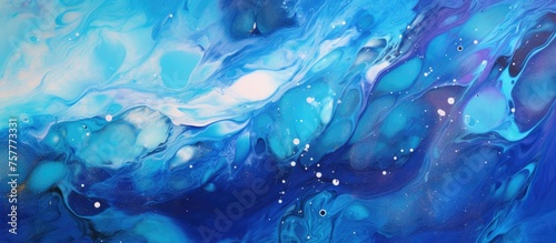 A detailed close up of a vibrant electric blue and white painting depicting an underwater landscape, inspired by marine biology and geological phenomena photo