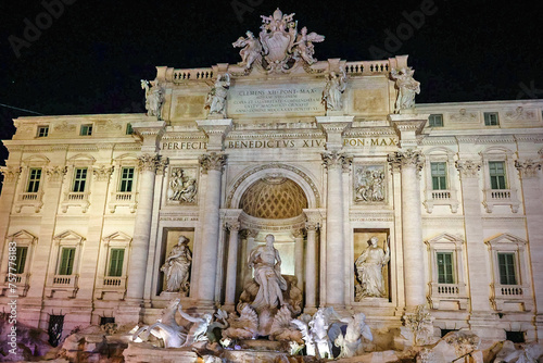 Baroque Trevi Fountain illuminated at night. Architect Nicolo Salvi, Rome, Italy