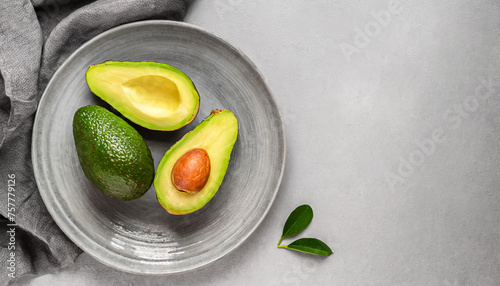 Avocado, fruit background. top view of avocado on grey background, copy space