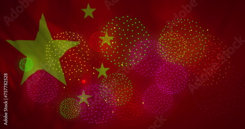 Image of fireworks over flag of china