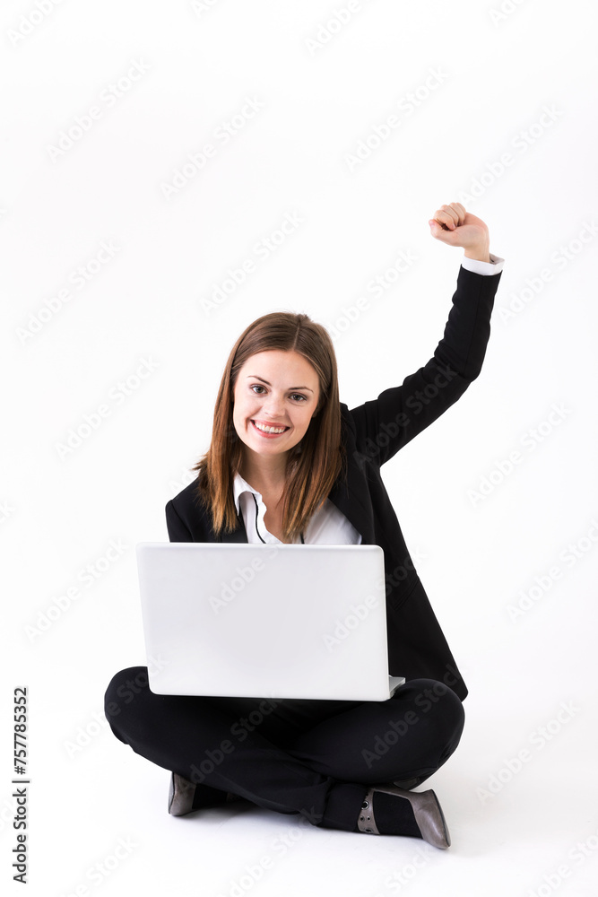 Portrait of a stylish Businesswoman using a laptop. Portrait of a stylish Businesswoman using a laptop.