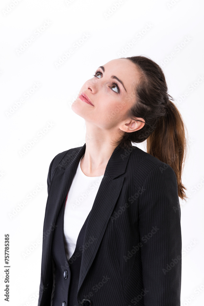 Thoughtful businesswoman looking up at copy space. Thoughtful businesswoman looking up at copy space.