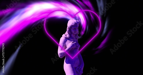 A statue is enveloped by a neon pink heart-shaped light effect