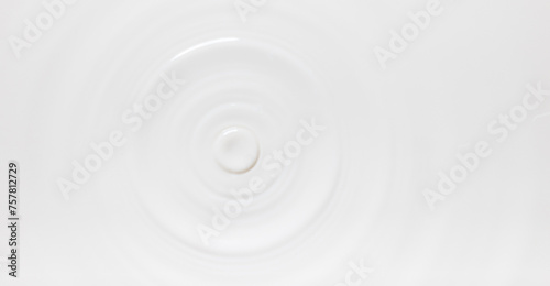 real photo of milk circle ripple, drop of splash water waves, top view, texture surface for template.