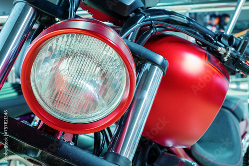 A close-up of a classic motorcycle headlight.
