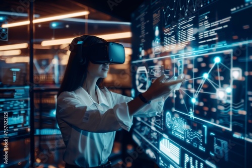 Woman in VR glasses using data visualization technology in the virtual reality - VR headset, big data, cyberspace