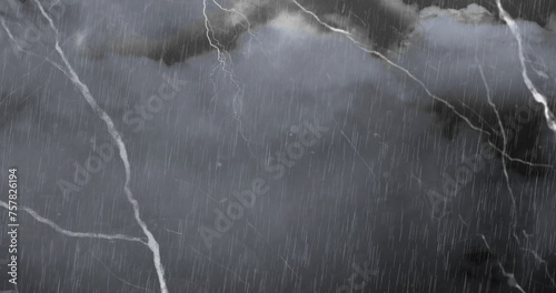 Image of bolts of lightning over rain and grey cloudy sky, black and white