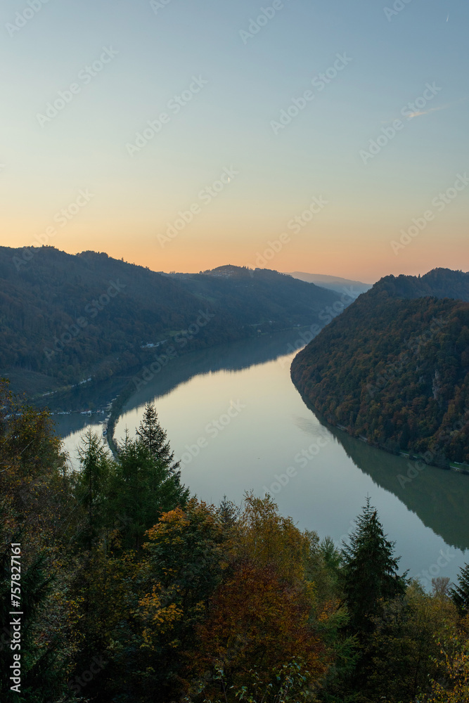 Dusk over river and hills