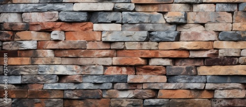 A detailed closeup of a brick wall showcasing different types of bricks including wood, composite material, and rectangular shapes. A beautiful mix of building materials and artistry