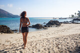 woman on a tropical beach in Thailand