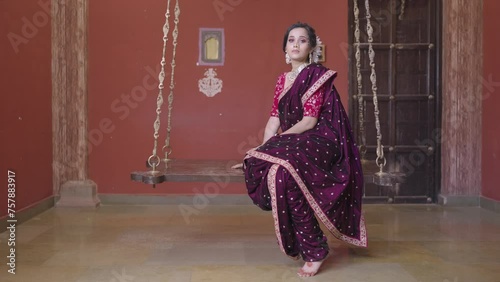 Playful Whispers: A Marathi Woman's Shy Laughter on the Swing, Engaging with a Friend