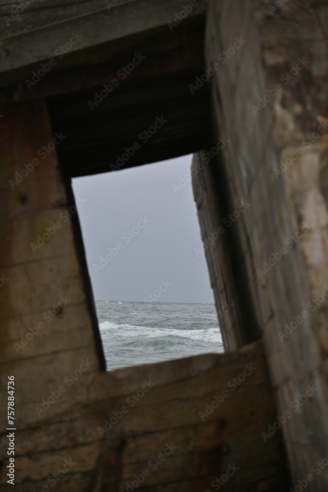 Window with a view on the sea in Denmark Window with a view on the sea in Denmark