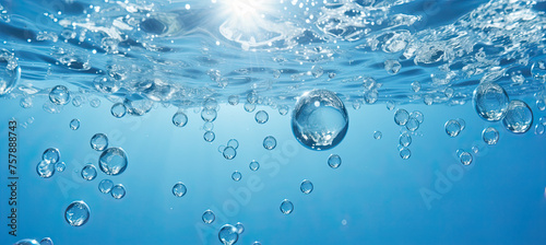 Oxygen bubbles in clear white water photo