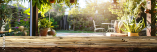 Wooden table and counter bar with blurred backyard backdrop  © Liliia