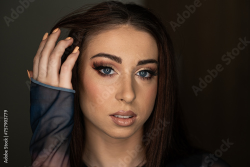 a photo of a young woman with make-up
