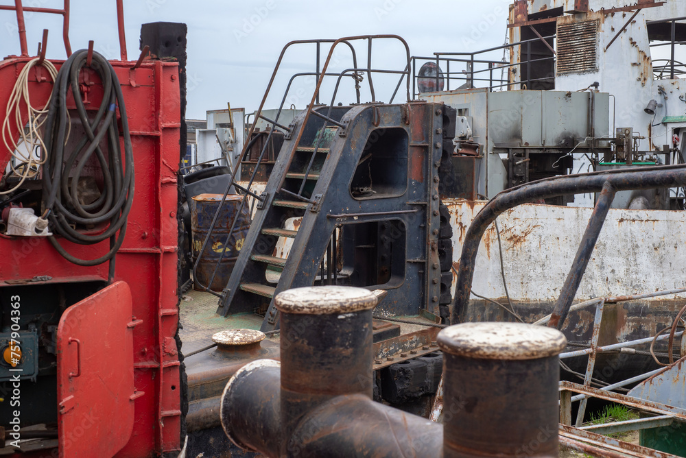 Old river vessels rust on dock repair shop Old river vessels rust on dock repair shop