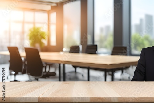 wooden table with blurred office scene