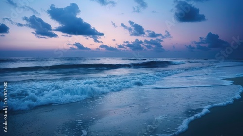 The soothing waves of a serene ocean captured at dusk  embodying the calmness of nature s rhythm.