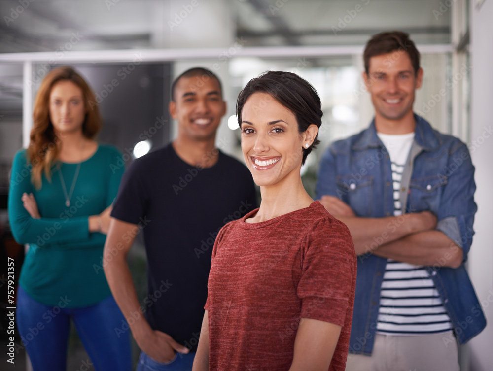 Obraz premium Businesswoman, happy and office portrait with team, creative and professional career. Leadership, female person and confident with diversity coworkers in collaboration and standing together.