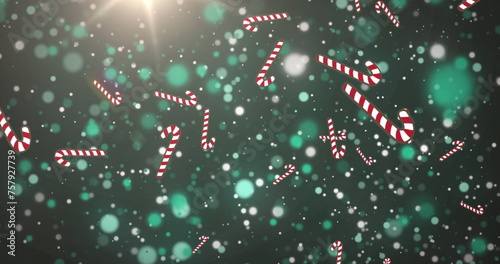 Image of candy cane falling over grey dots
