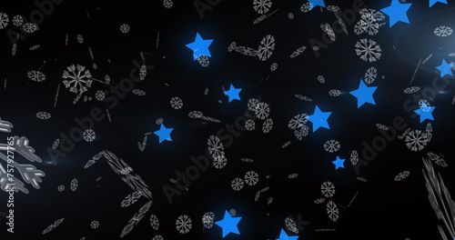 Image of snow falling over blue glowing stars
