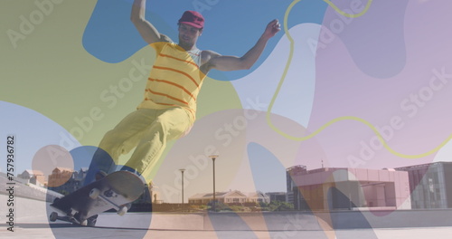 Image of colourful spots over caucasian man skateboarding