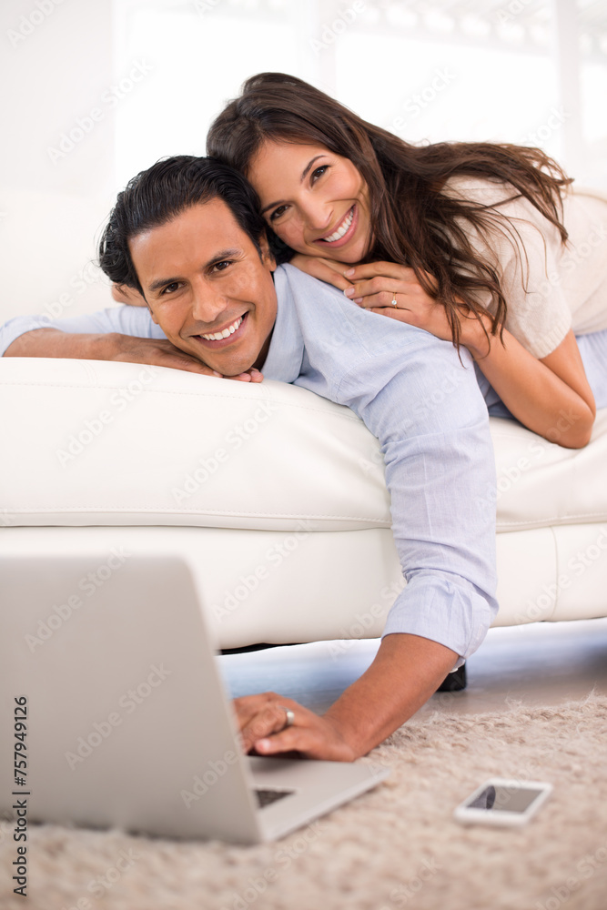 Portrait, couple and laptop on romantic date for relaxing, streaming or browsing on couch at home. Phone, husband and wife in love and happy for typing, bonding and together with social media