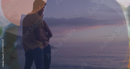 Image of frame over happy biracial couple embracing