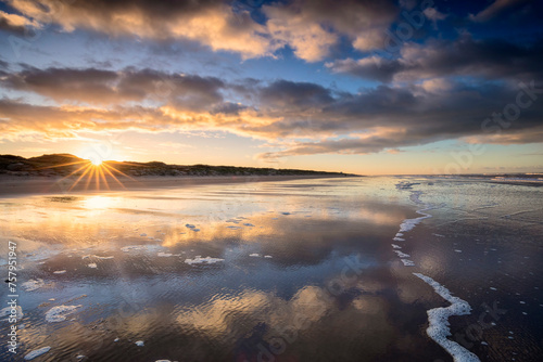golden beautiful sunrise on Dutch sea coast