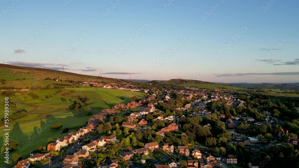 Hobson Moor Hills in Stalybridge, Tameside, Greater Manchester, England during sunset by 4K drone