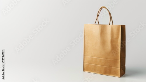 Isolated paper shopping bag on plain background.