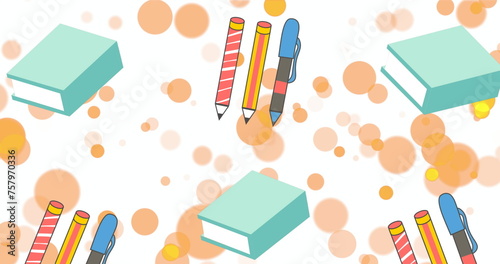 Image of orange spots over pen, pencils and blue books