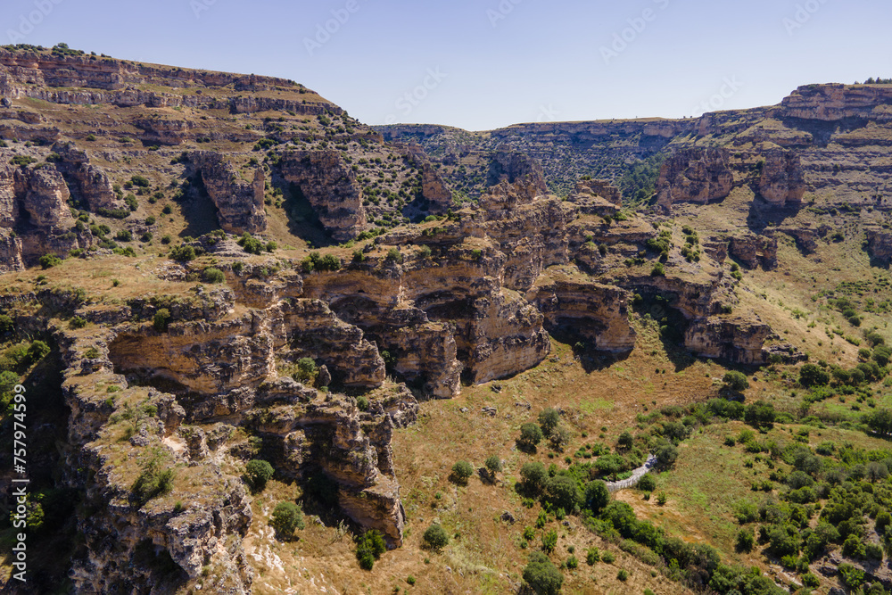 Rocky cliff inside Ulubey canyon in Turkey, Aerial tilt up shot