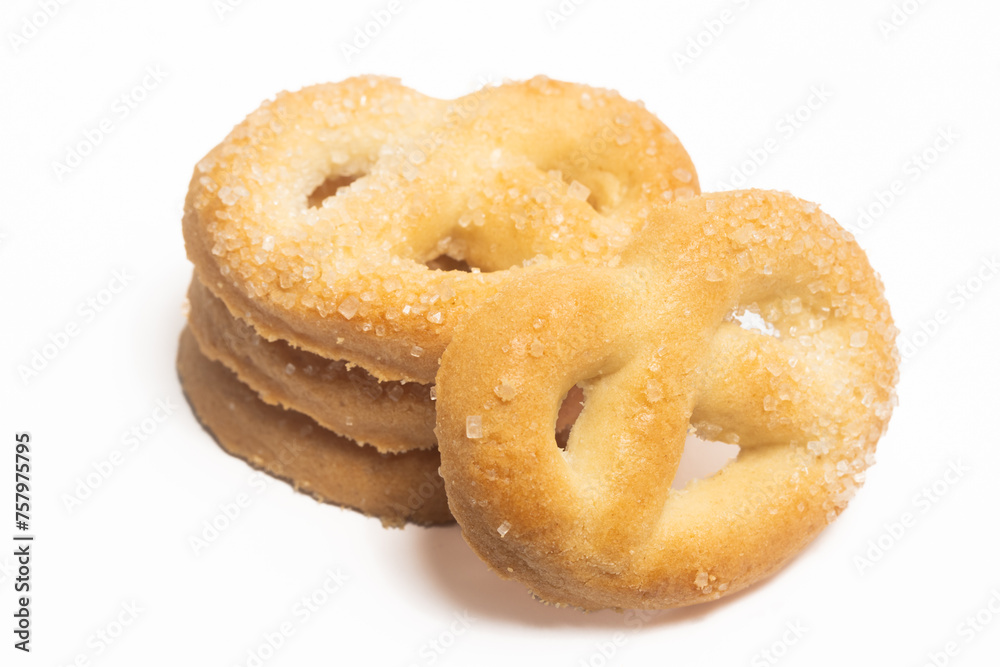 Stacked of danish butter cookies the pretzel cookie isolated on white background clipping path Stacked of danish butter cookies the pretzel cookie isolated on white background clipping path
