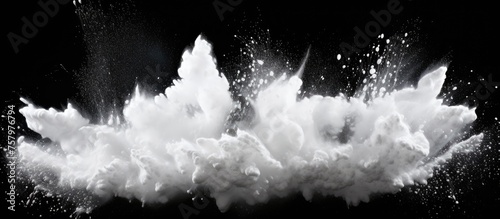 Dynamic White Powder Explosion Captured in High-Speed Action on Black Background