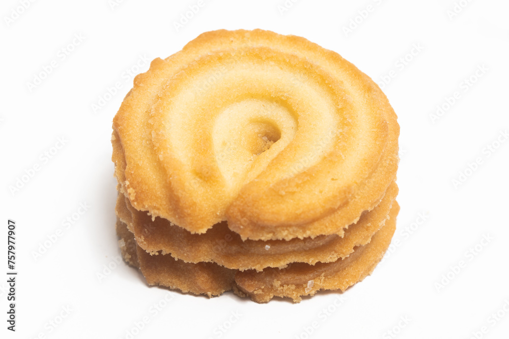 Stacked of danish butter cookies the vanilla ring cookie isolated on white background clipping path Stacked of danish butter cookies the vanilla ring cookie isolated on white background clipping path
