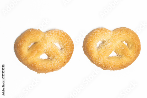 Two danish butter cookies the pretzel cookie top view isolated on white background clipping path © dwiangga