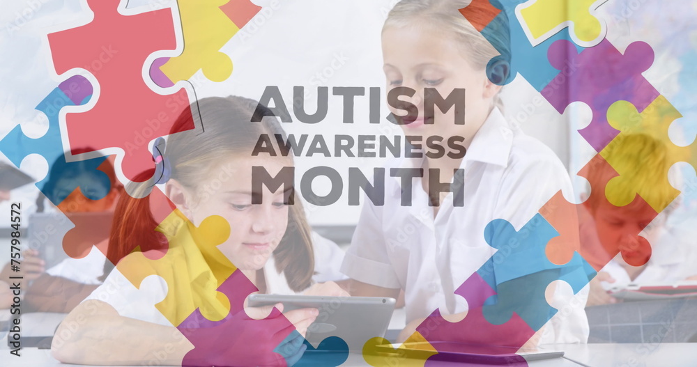 Image of autism awareness month text over diverse schoolchildren using tablet - obrazy, fototapety, plakaty 