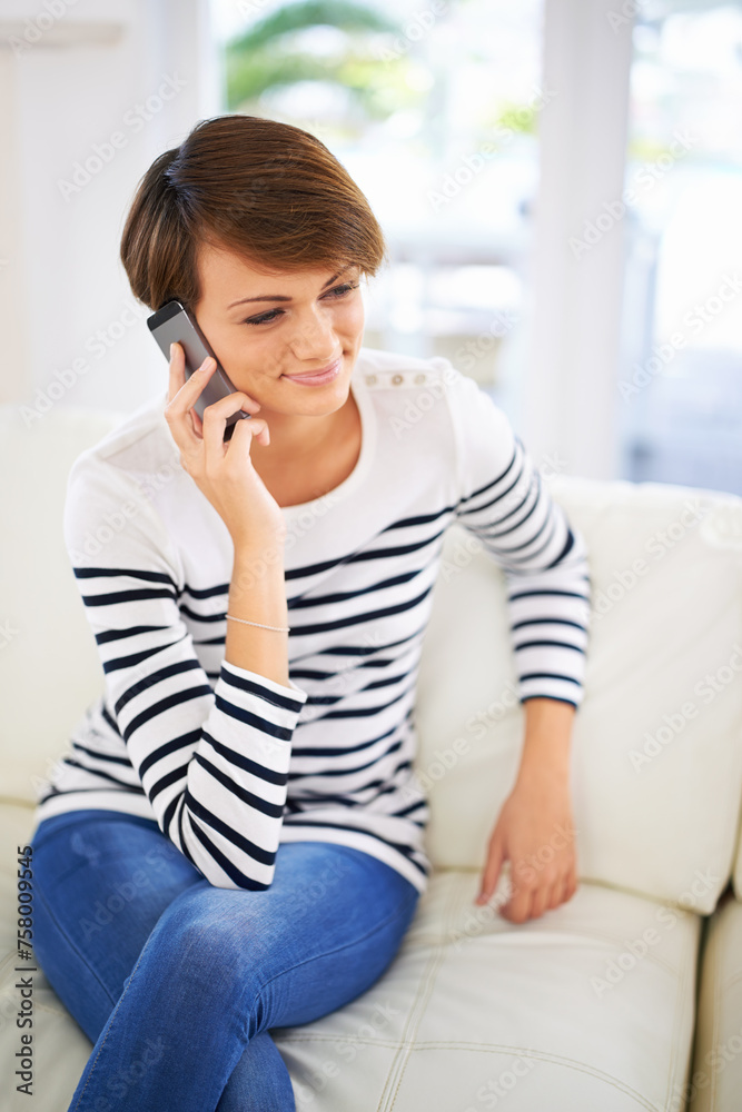 Smile, phone call and woman on sofa with mobile, communication or connection in home. Couch, smartphone and girl in living room with chat, talking and listening with networking, relax or conversation