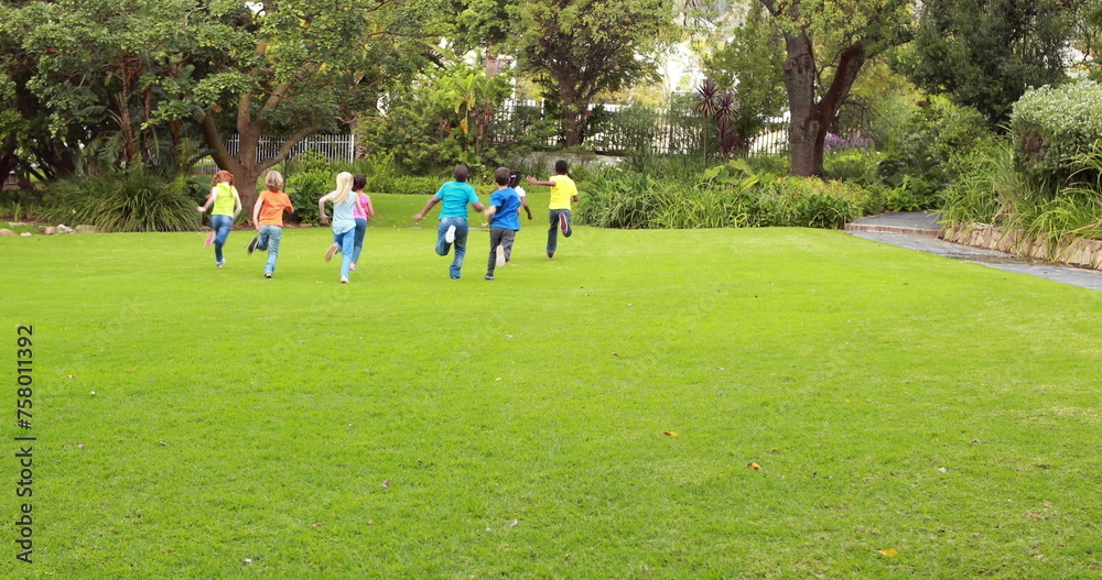 Image of back to school text over schoolchildren playing outdoors Image of back to school text over schoolchildren playing outdoors
