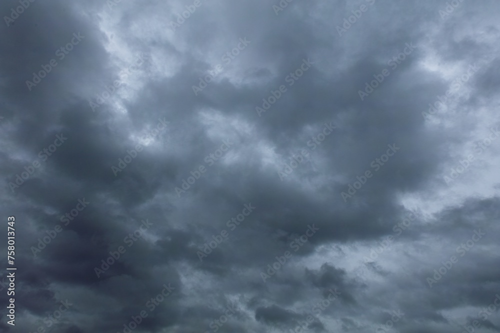 Dramatic dark sky and clouds. Cloudy sky background. Black sky before thunder storm and rain.