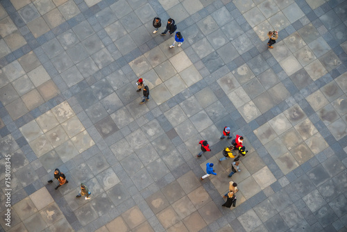 Fototapeta Naklejka Na Ścianę i Meble -  View of the people on the street from above.